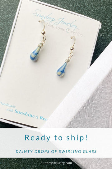 Dainty teardrop earrings in swirling blues and cream are going in the mail today